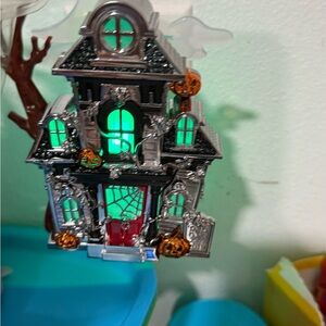 Bath & Body Works Haunted House plug in light up  with Green and Silver Accents
